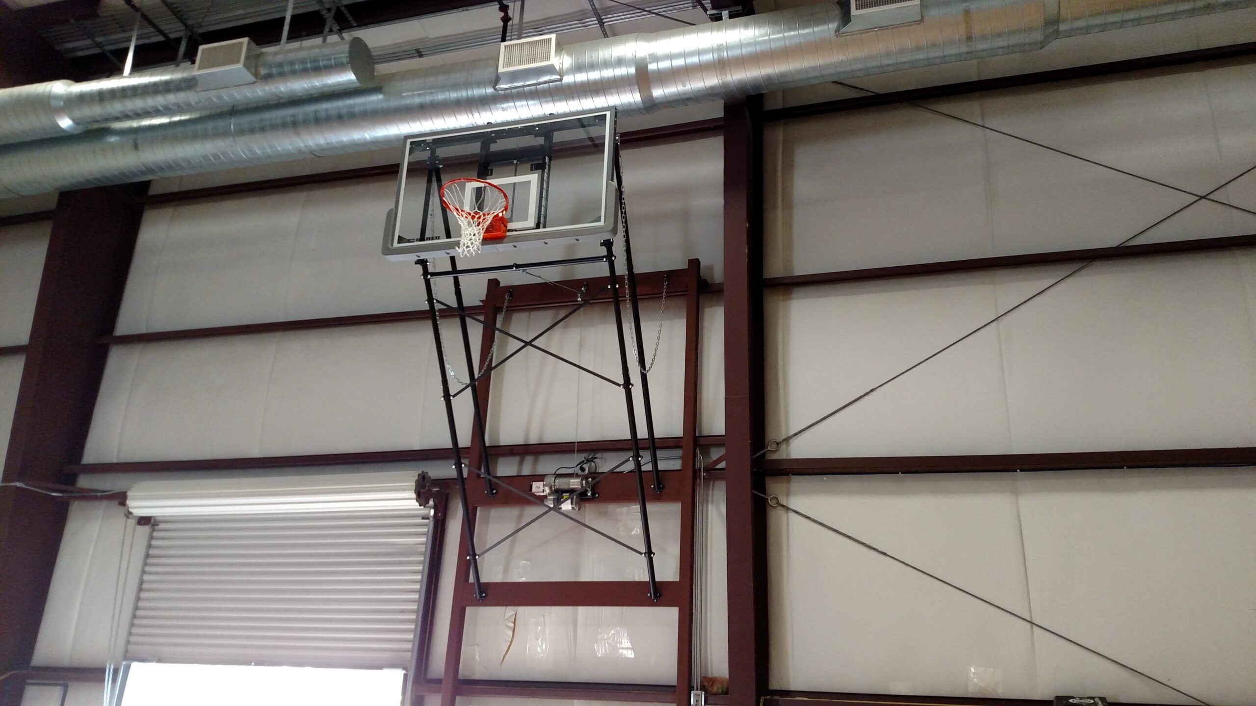 Side Fold Wall Mount Basketball Goal - South Texas Sport Court