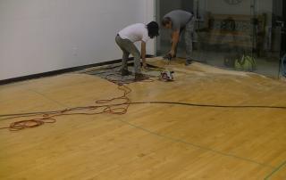 Cutting out water damaged hardwood flooring