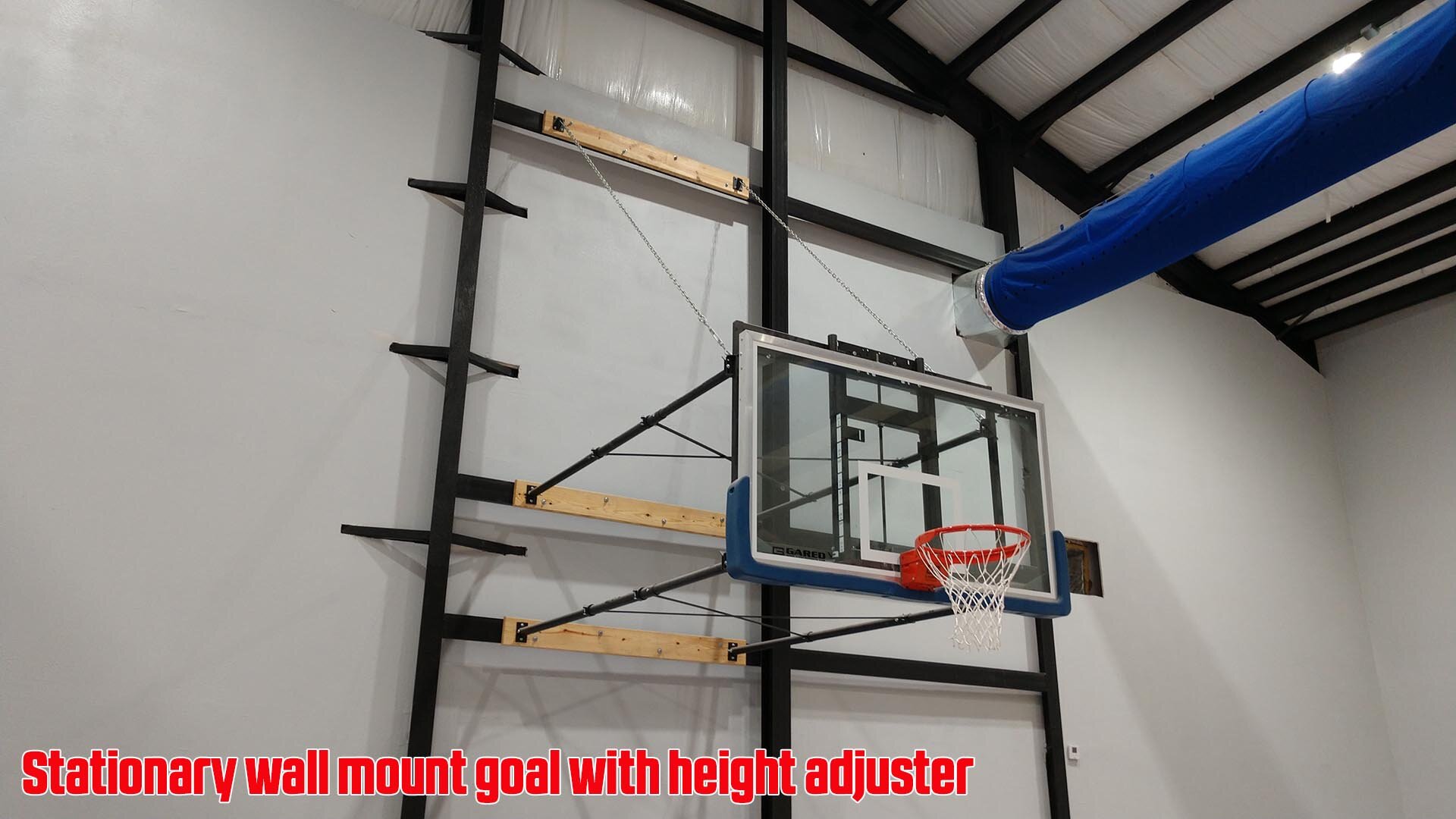 Gared Sports stationary wall mount basketball goal with manual height adjuster