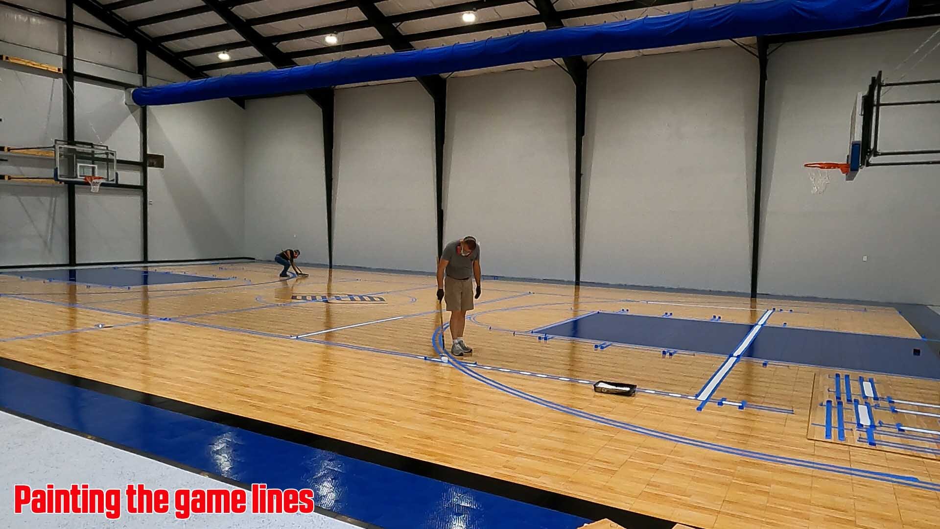 Painting game lines on a gym floor