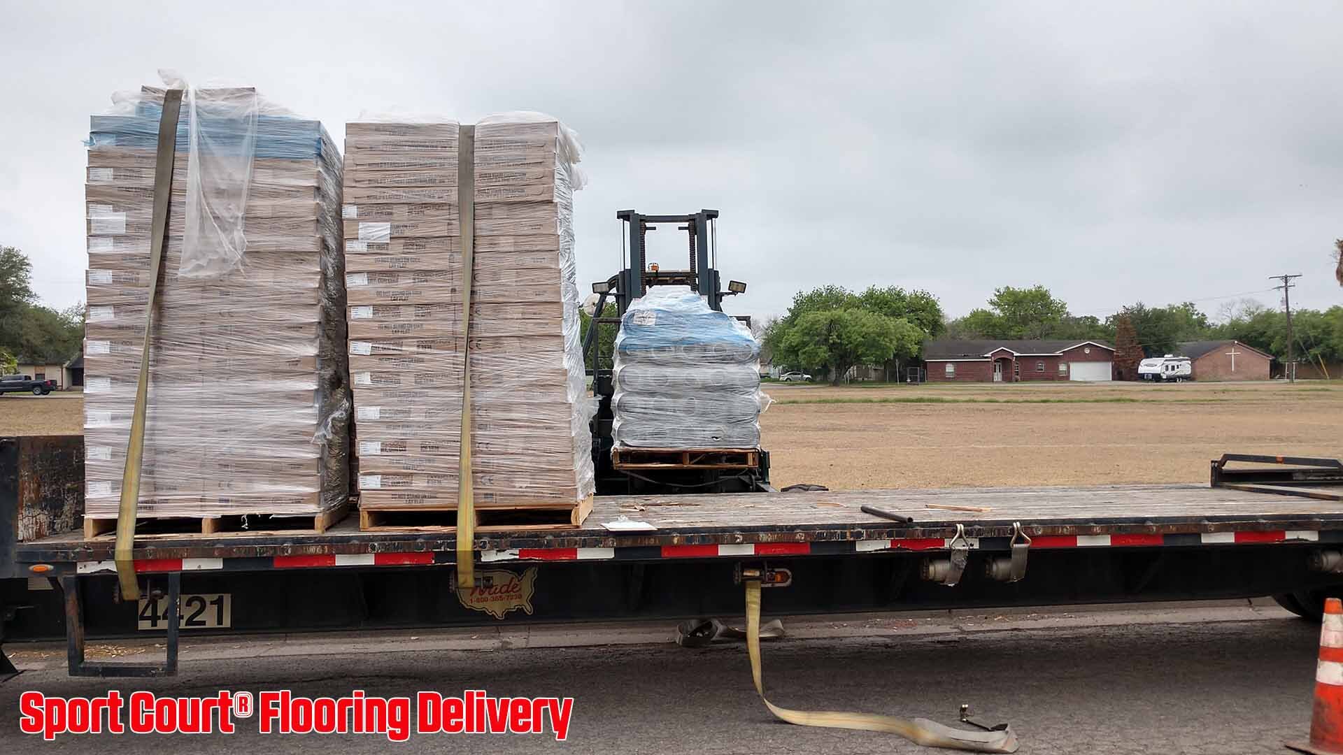 Unloading flooring at the Boys and Girls Club of Kingsville