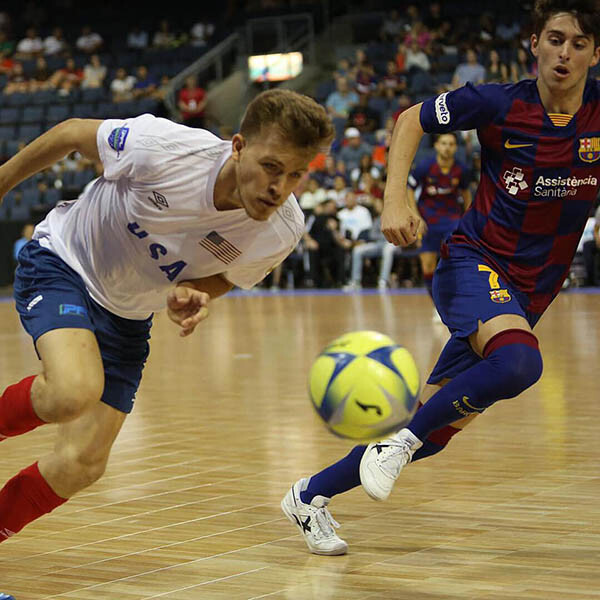 Futsal player on Sport Court® gym flooring